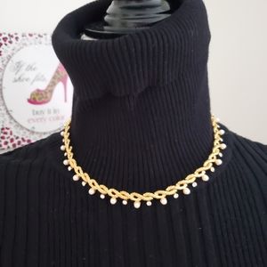 Pearl and gold tone necklace